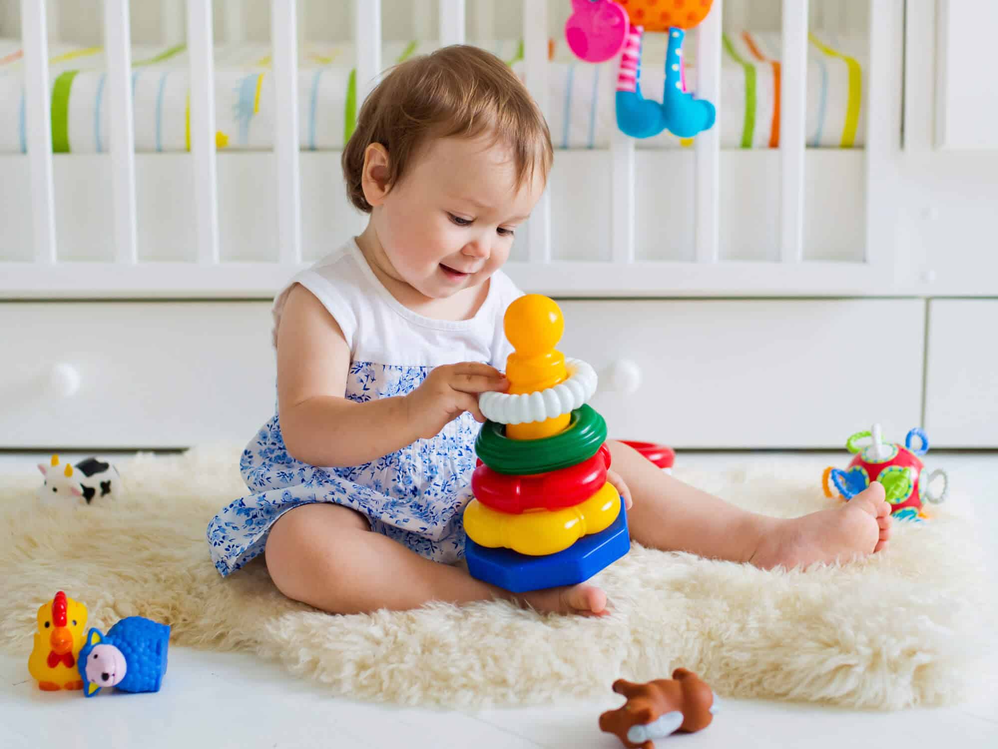 Toddler playing with toys - Toy Safety Awareness
