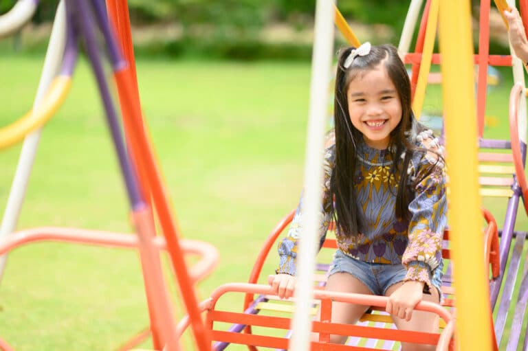 Child Playing having fun on playground