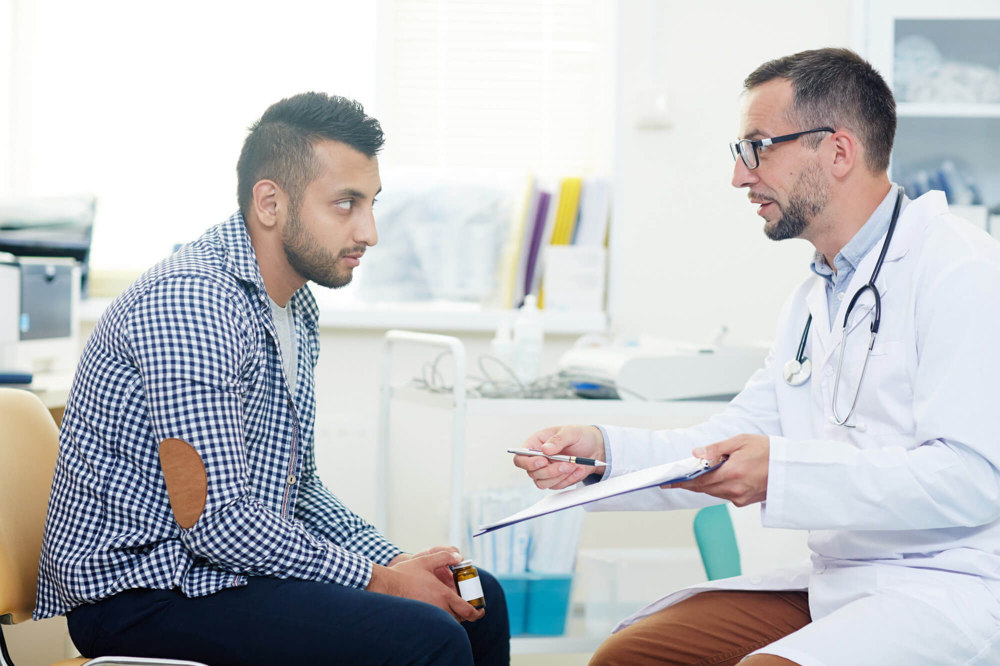 Doctor talking to patient -medical error